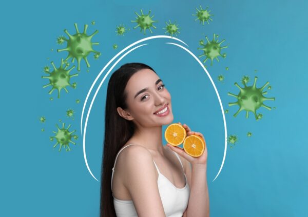 femmes protégée des virus et pleine d'énergie grâce à la vitamine C