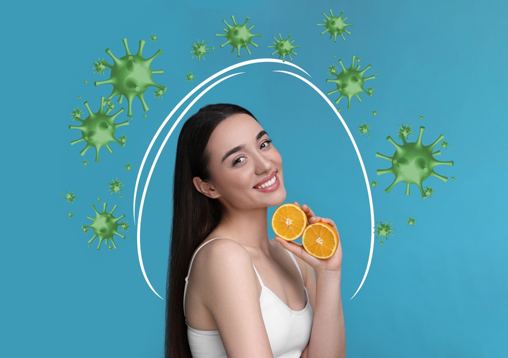 femmes protégée des virus et pleine d'énergie grâce à la vitamine C