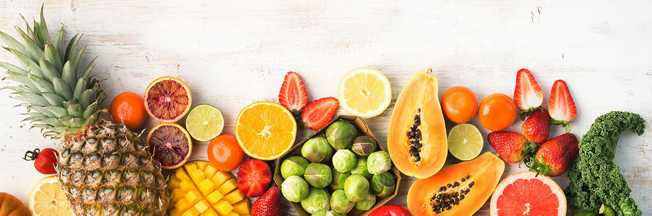 Photo représentant plusieurs fruits apportant de la vitamine C comme des oranges, des citrons etc...